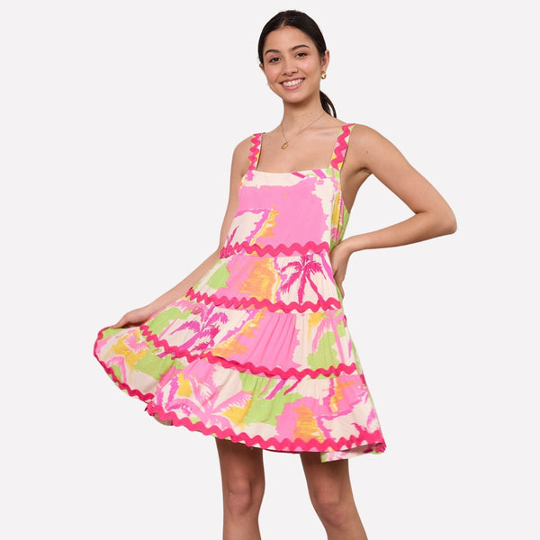 This fun mini dress has hot pink ric rac detailing on the shoulder straps and the tiered mini skirt