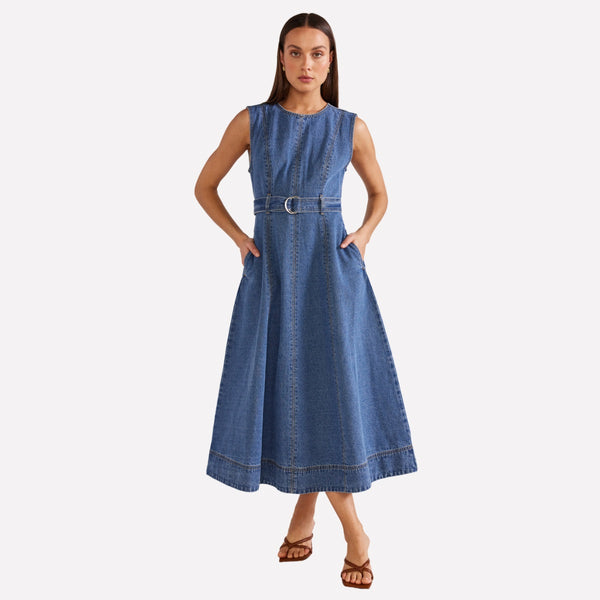 Eva Denim Midi Dress by Staple the Label. This dress has a sleeveless design and features an Aline midi skirt.