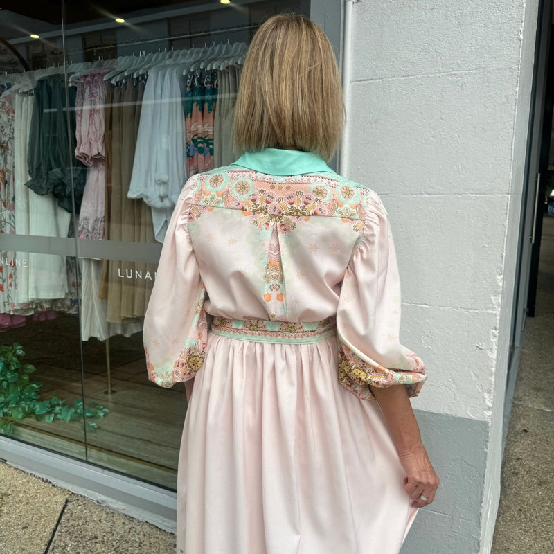 Back view of the dress - the upper back has a floral print