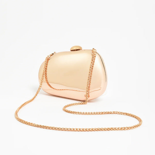 This sculptural gold clutch also has a detachable gold shoulder chain.