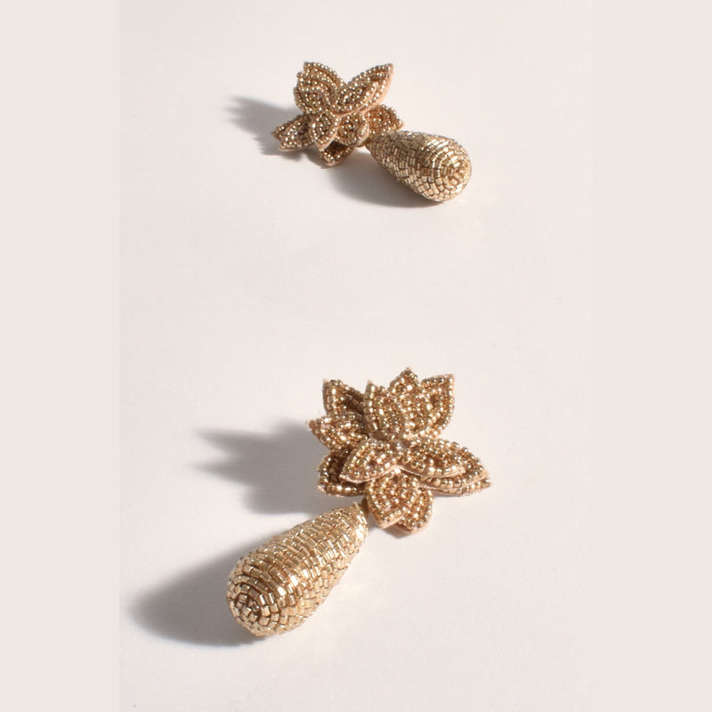 Aila Beaded Earrings have a gold leaf shaped stud and beaded drop