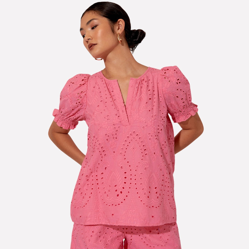 Amity Deco Broderie Top in pink. Features a round neckline with V opening, short sleeves and a loose fit body