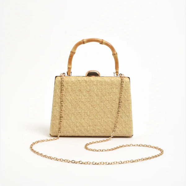 It also has a detachable gold chain shoulder strap.