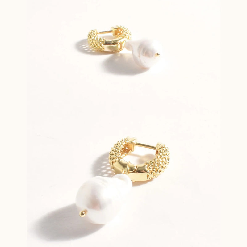 These earrings have a hinged closure.