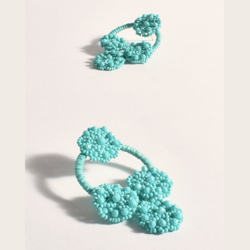 Beaded Crochet Earrings in Teal have a stud closure