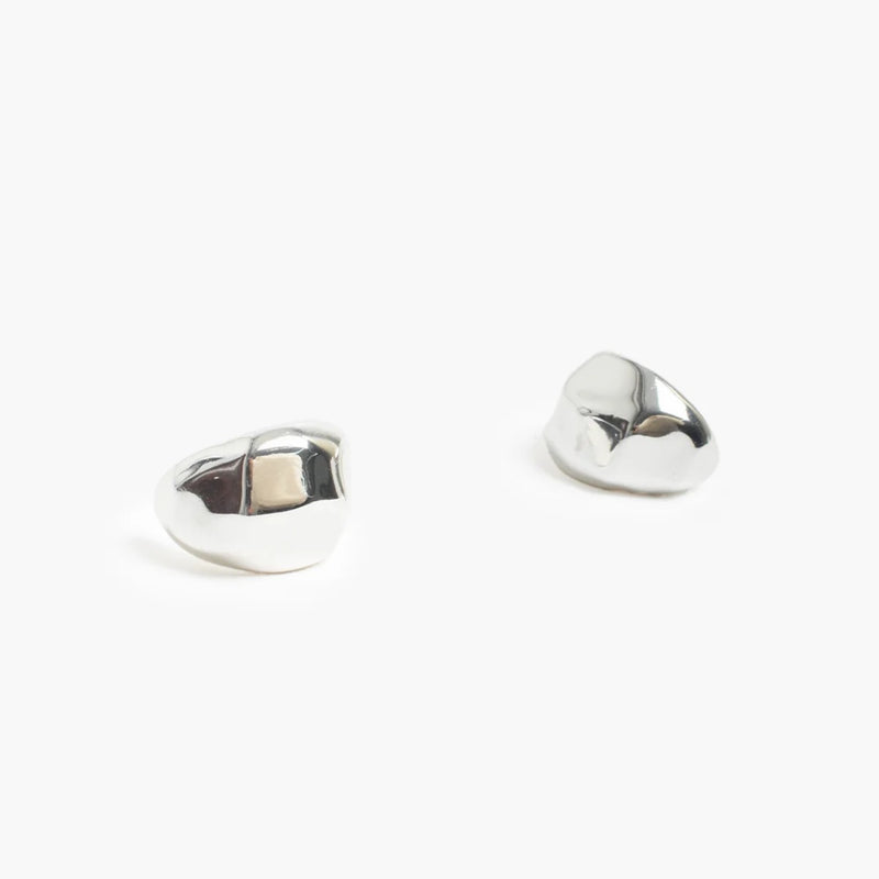 Bevelled Metal Hoop Earrings in Silver. They have a stud back closure.