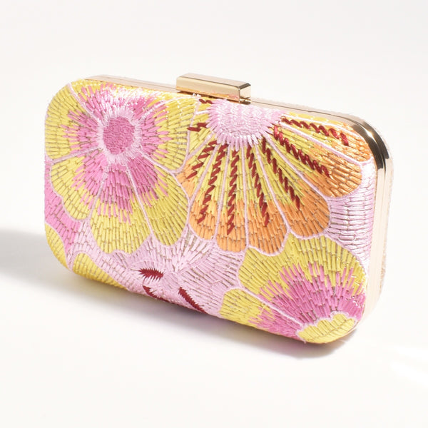 Our Calypso Floral Woven Structured Clutch has a lovely multi coloured floral design in pink, yellow, orange.