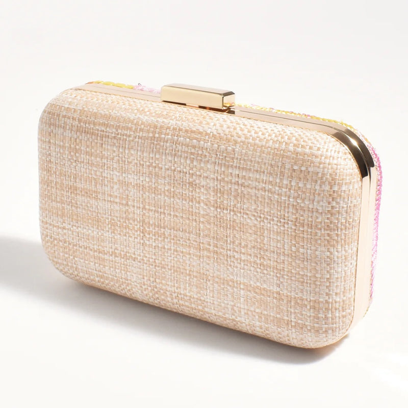 The back of the clutch has a natural woven detail.