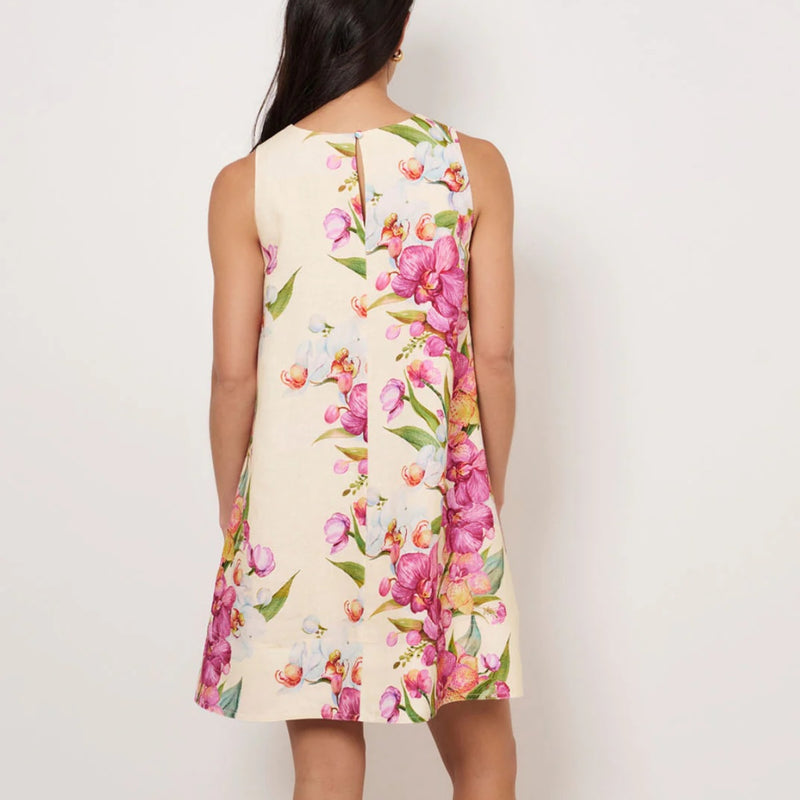Back view of the dress - it has a button closure on the neckline.