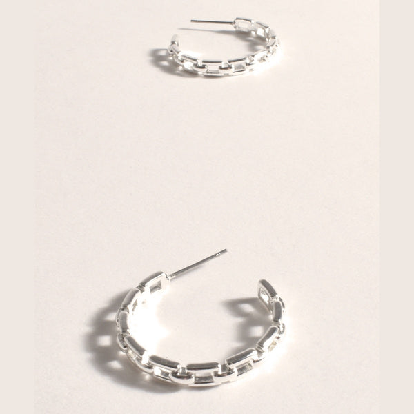 These silver hoop earrings have a stud back closure