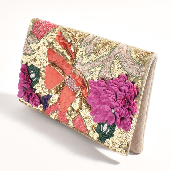 the clutch has a tan coloured fabric base with a brightly coloured floral sequin and bead design on the front.