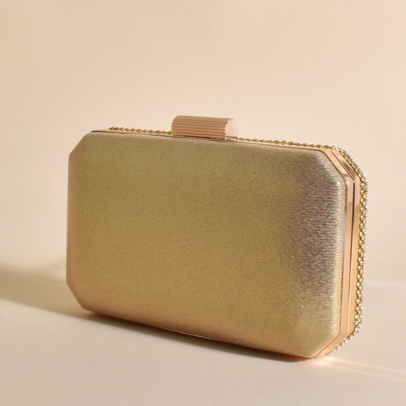 the back of the clutch has a gold back and that way, you can decide which way you want to wear it