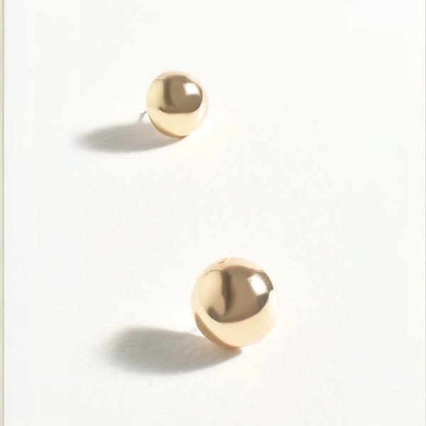 Our gold Dome Stud Earrings.