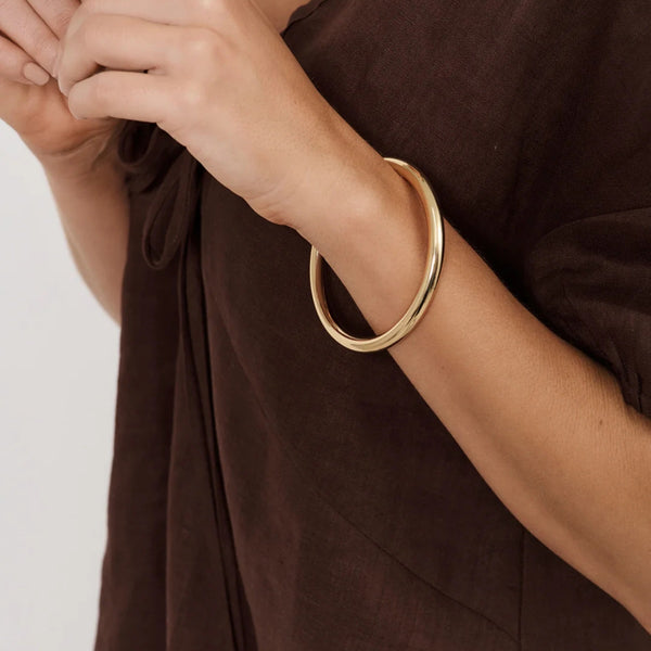 Model wearing our Ellery Essential Metal Bangle (Gold)