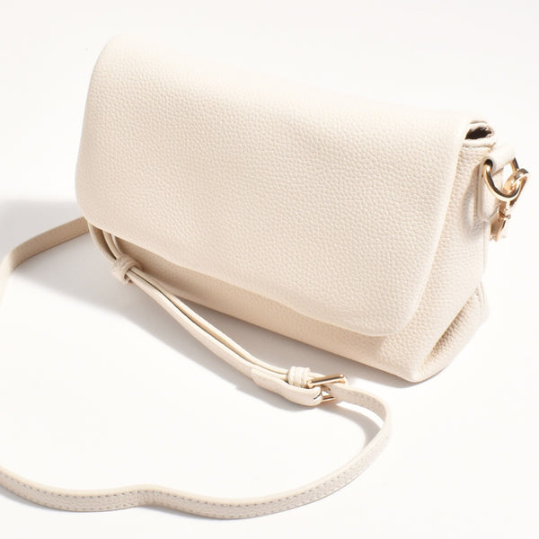 The bag also has a detachable crossbody strap