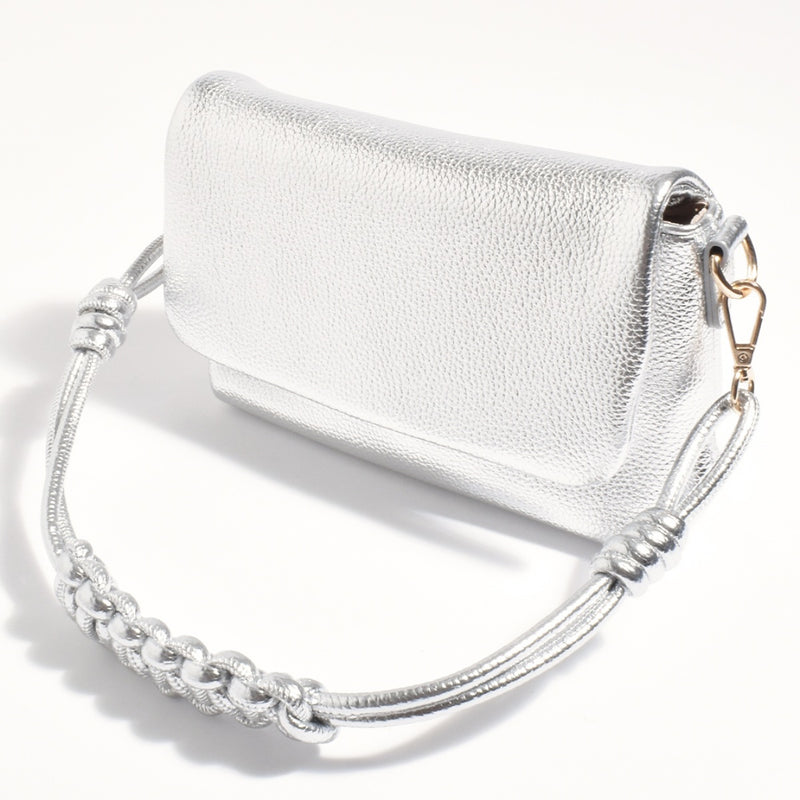 This bag includes two straps - including a knotted shoulder strap