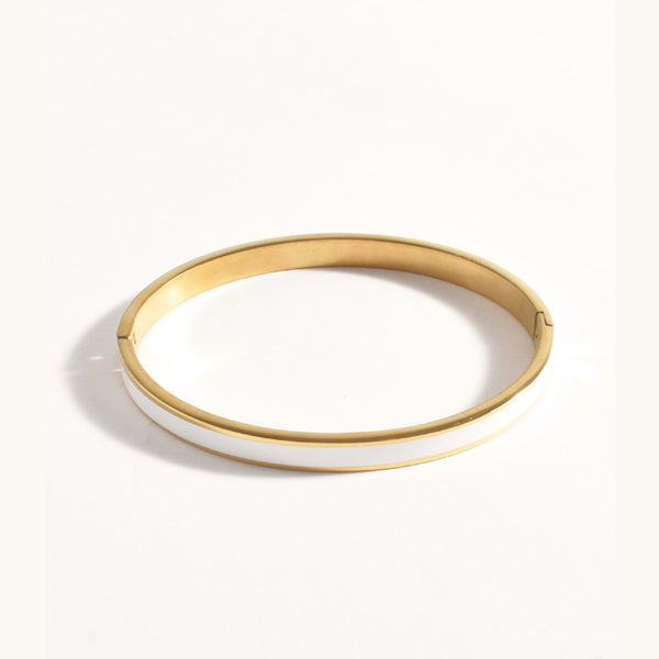 Gold and white enamel thin hinged bangle