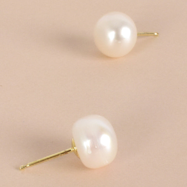 These freshwater pearl earrings have a gold stud closure