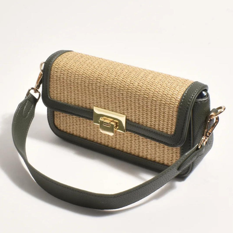 Our Hattie Weave Crossbody Bag is compact and has a natural coloured weave and olive green contrast trim