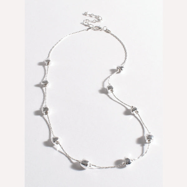 Interval Shaped Necklace with silver metal balls.