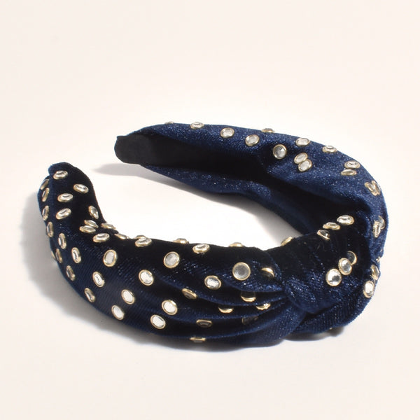 This stunning headband features clear circular jewels on the entire headband
