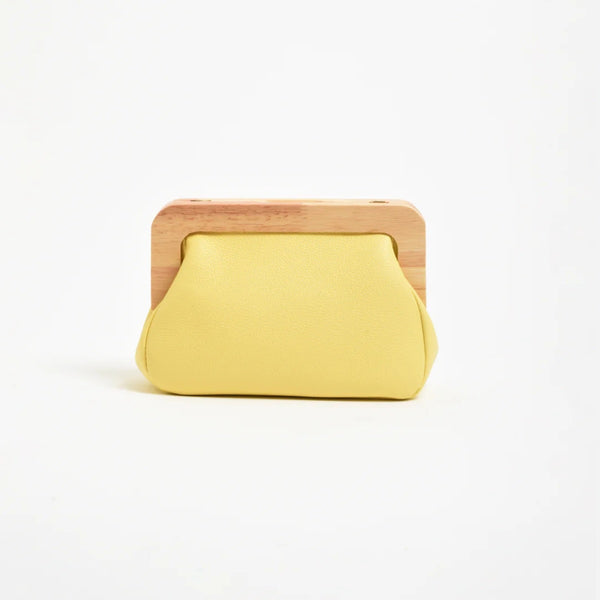 Kimmi Timber Frame Clutch in yellow.
