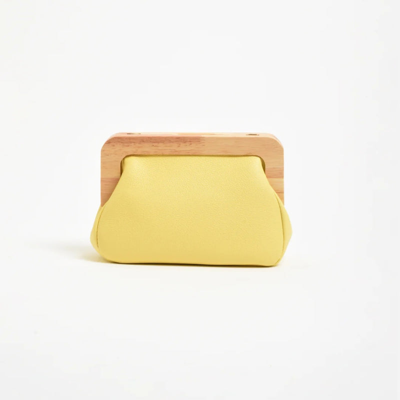 Kimmi Timber Frame Clutch in yellow.