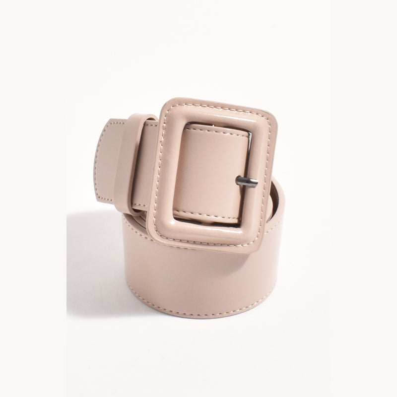 Leather Covered Buckle Belt in a nude pink colour.