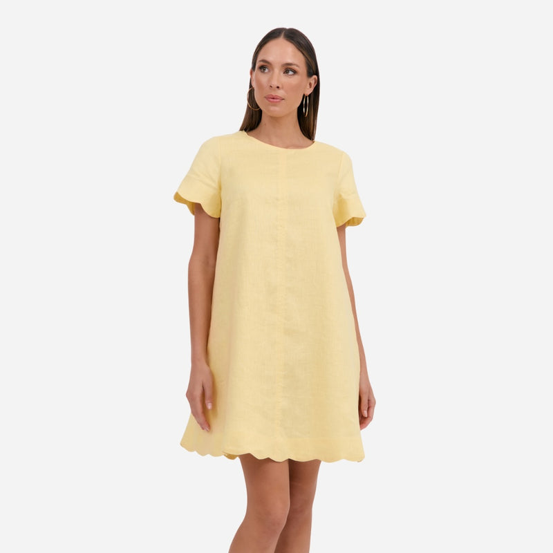 Features a round neckline, short sleeves and a relaxed shift style body.