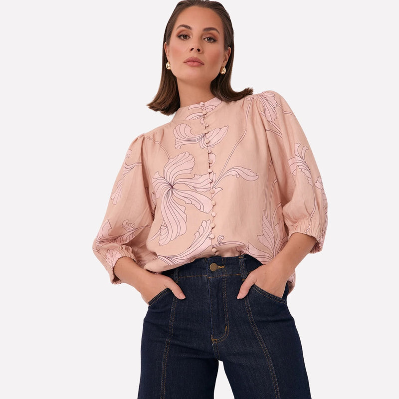 Features self fabric buttons which also elevates the look of the shirt.