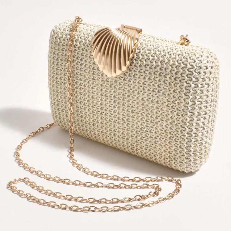 Inspo pic featuring the cream version showcasing the detachable gold chain shoulder strap