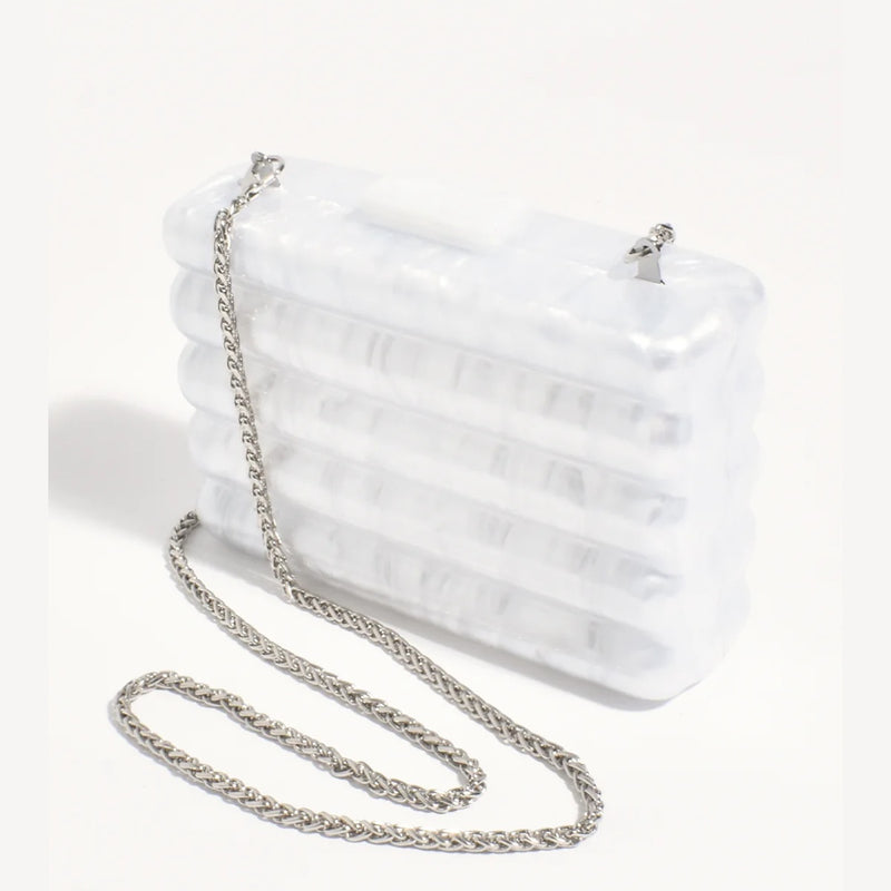 This white structured clutch also has a detachable silver shoulder chain strap.