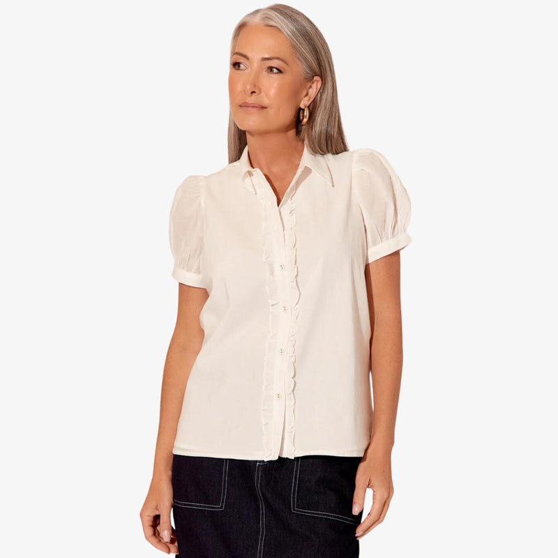 Luna Short Sleeved Shirt with frill accents extending down the button front