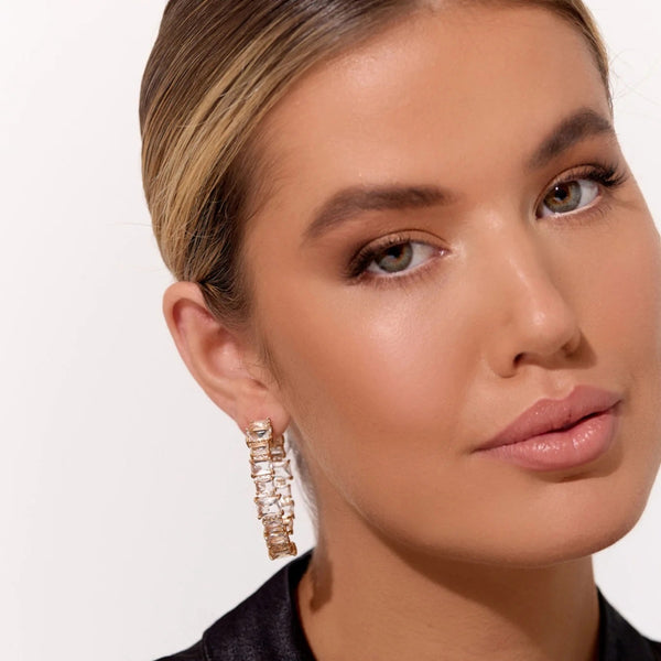 These large hoop earrings have clear crystals.