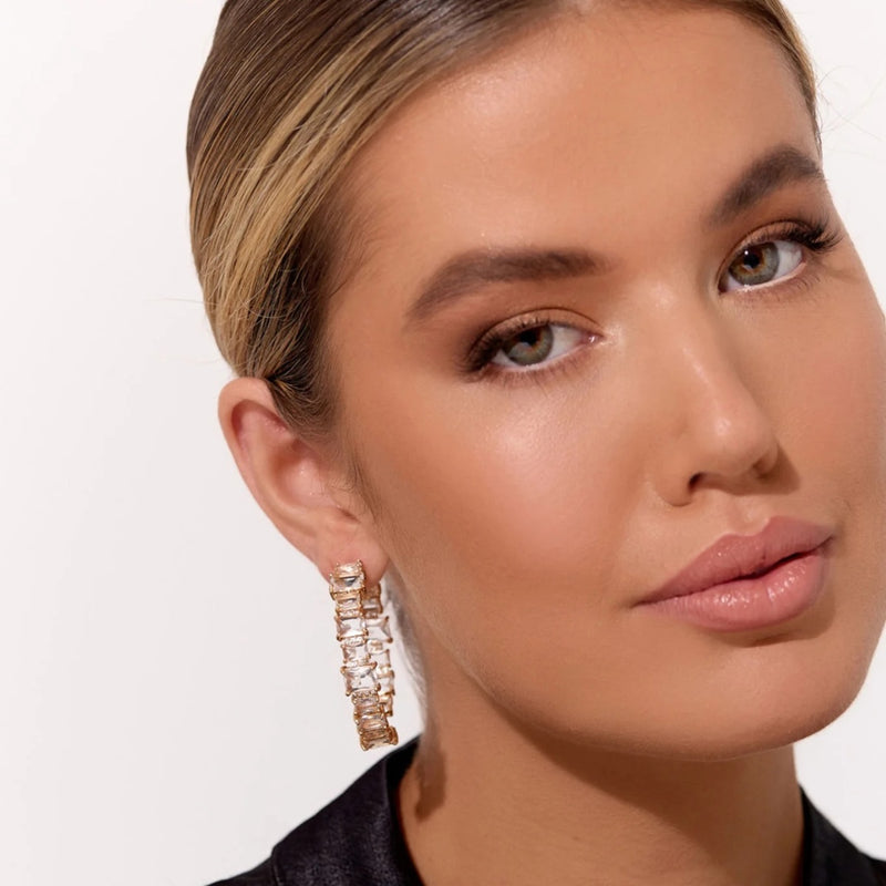 These large hoop earrings have clear crystals.