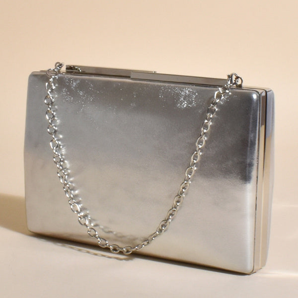 This clutch also has a detachable silver strap