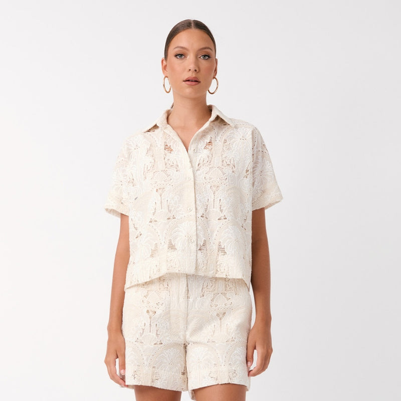 Our Millie Paradiso Broderie Shirt is available in a cream colour.