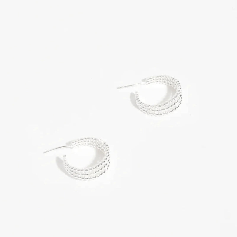 These earrings have a trio mini metal ball hoop detail.