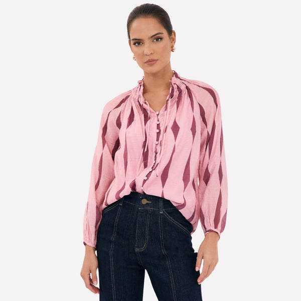 Our Opal Top is available in a San Lorenzo pink and burgundy print.
