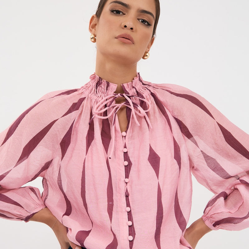 The beautiful neckline is shown here closed over using the drawstring ties.
