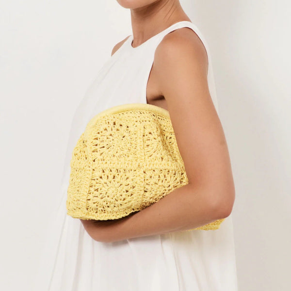 Patterned Paper Weave Clutch in a lovely butter yellow colour.