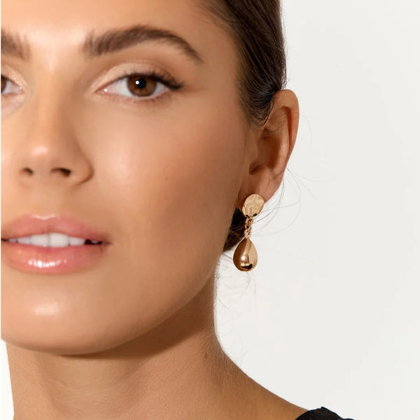 Inspo image featuring a model wearing the gold version.