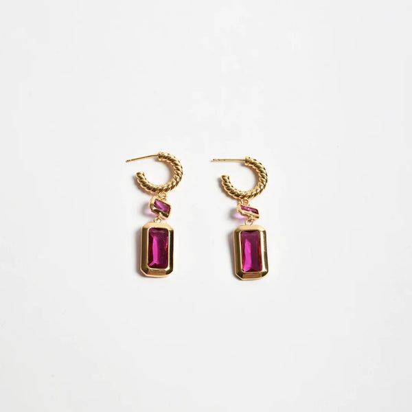 These stunning earrings have a twisted gold hoop and a rectangle shaped jewel drop in hot pink.