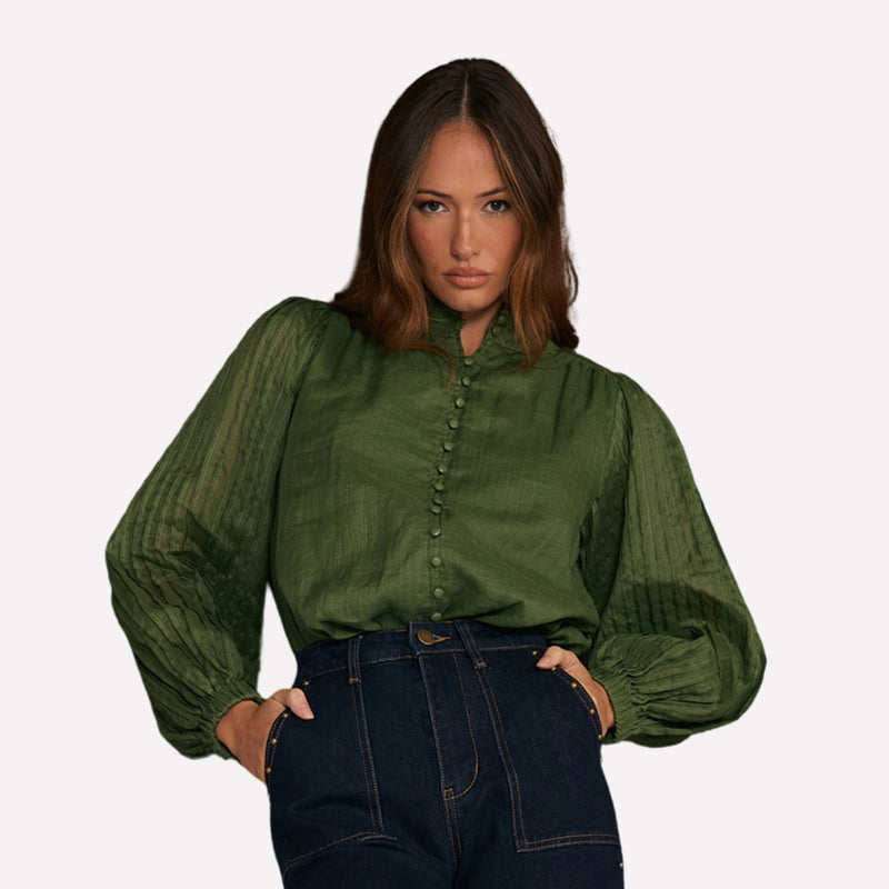 The shirt looks fab with denim or a skirt.