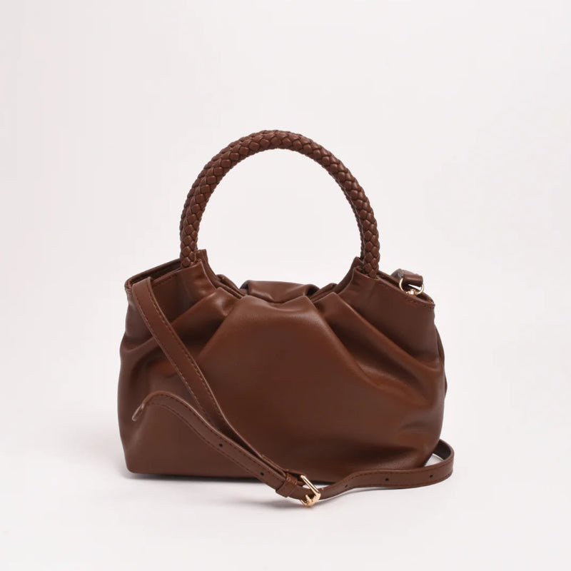 It can also be used as a crossbody bag using the detachable strap.