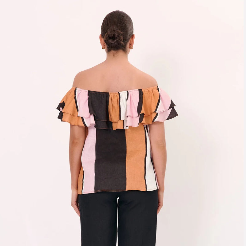 Back view of the top - being worn off the shoulder.