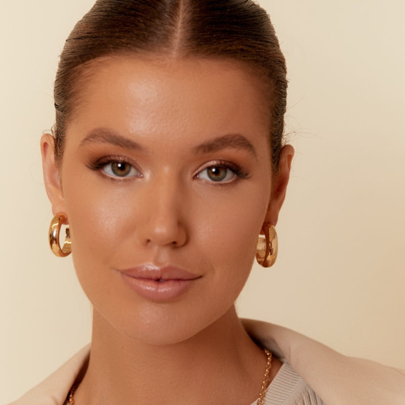 Siera Chunky Hoop Earrings in Gold with a stud closure