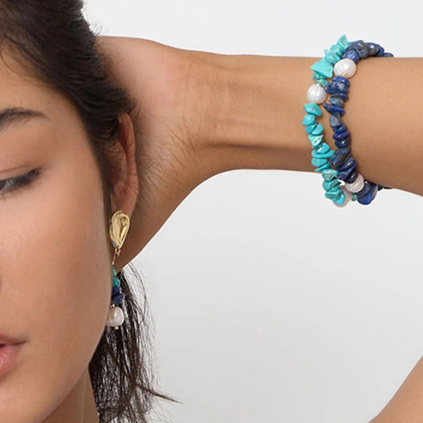Model wearing the double strand bracelet.