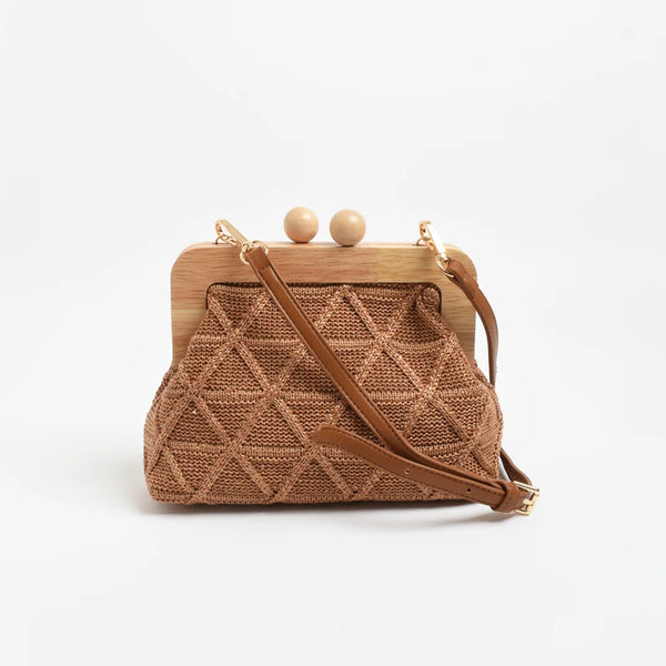 The clutch also has a detachable vegan leather shoulder strap so it can be used as a bag.