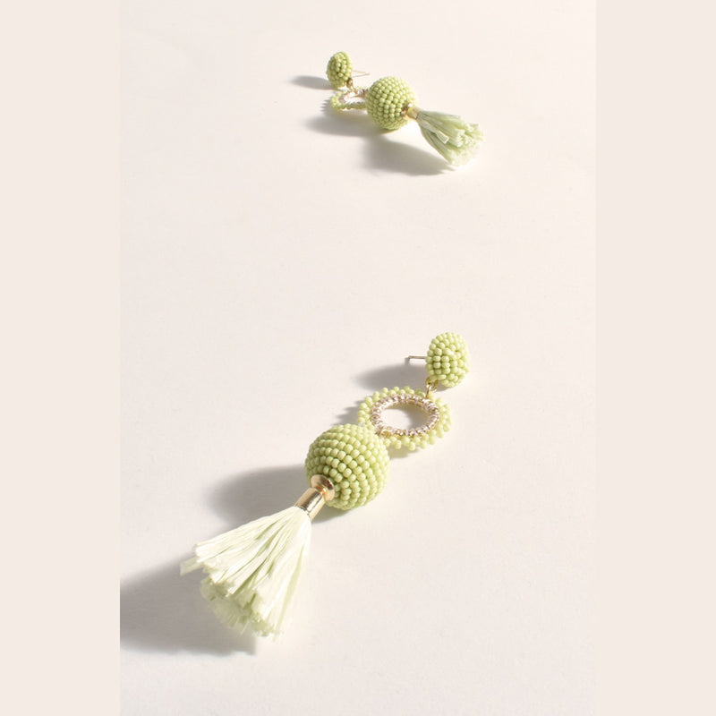 These lime green earrings have a beaded stud, beaded ring drop and tassel drop 
